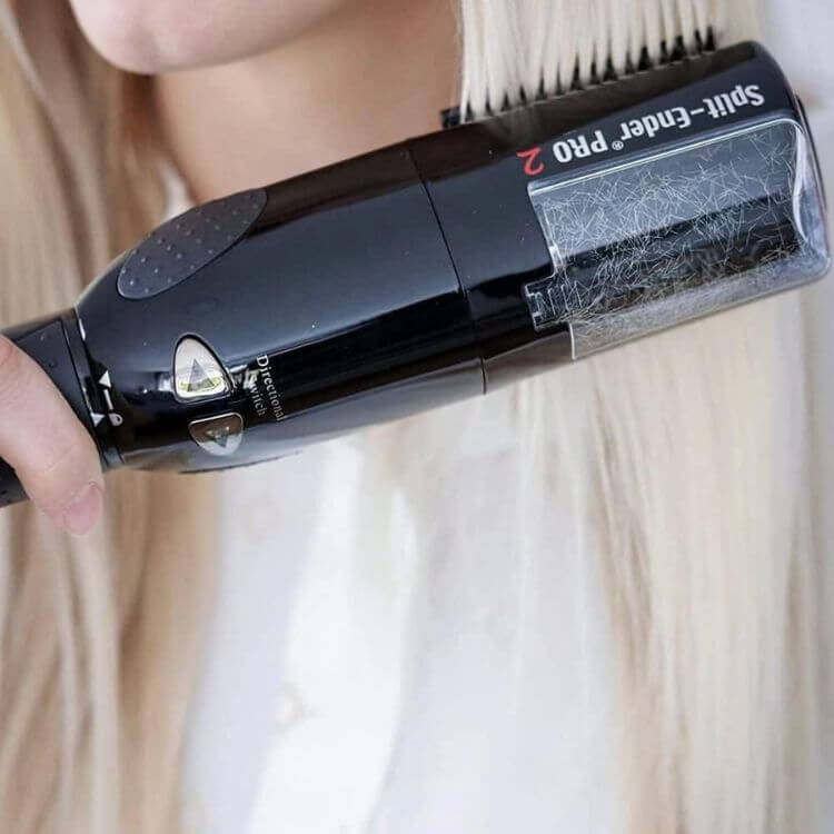 close up of blonde hair woman using split end trimmer device