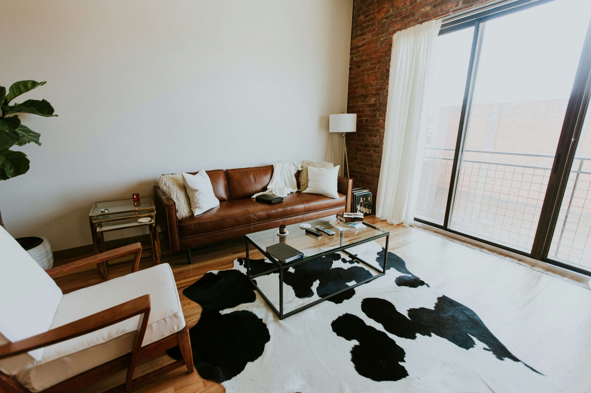 black and white cowhide rug in living room