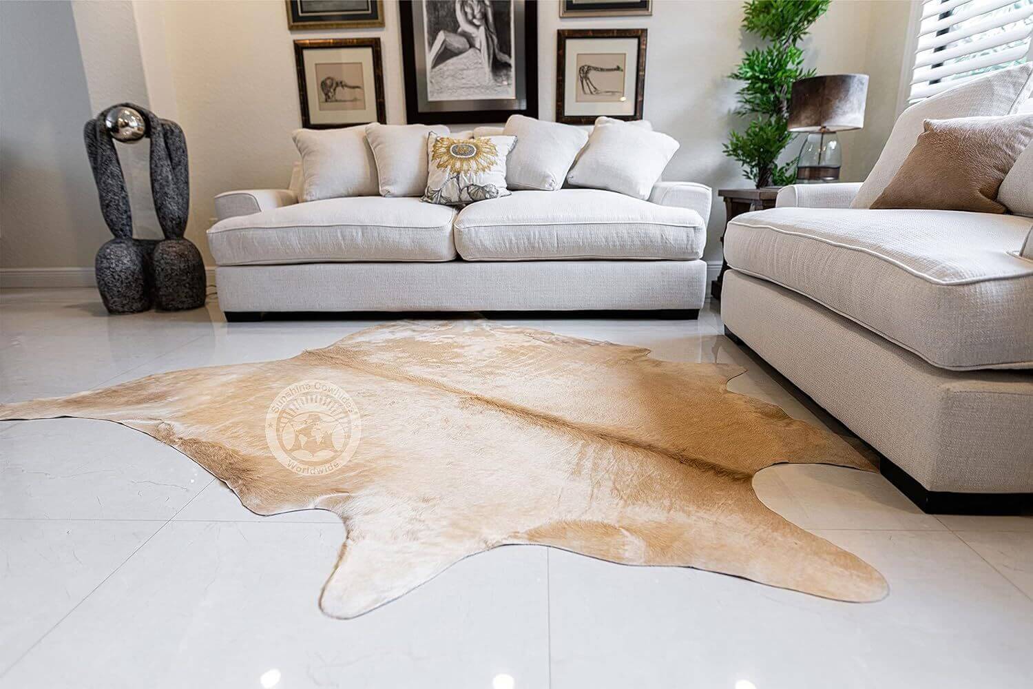 beige cowhide rug in living space